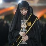 آیین لاله‌گردانی خدام حرم مطهر حضرت شاهچراغ علیه السلام، در رثای شهادت امام رضا علیه السلام